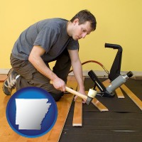 arkansas map icon and a hardwood flooring installer