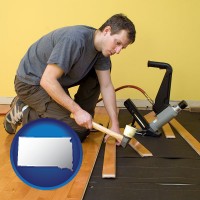 south-dakota map icon and a hardwood flooring installer
