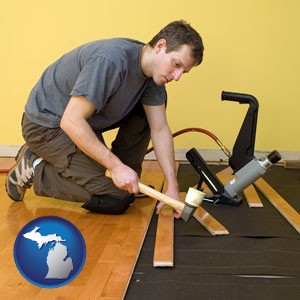 a hardwood flooring installer - with Michigan icon